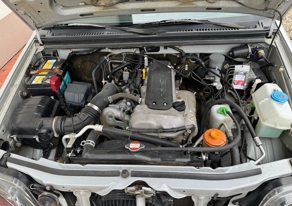 Suzuki Jimny cena 33900 przebieg: 166000, rok produkcji 2011 z Radomsko małe 497